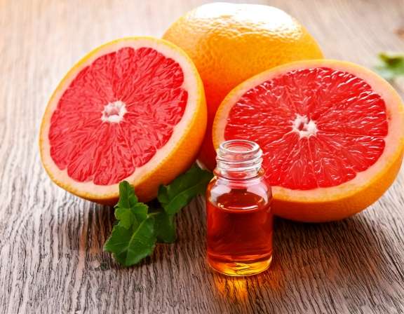 firefly generate an image of grapefruit essential oil; aromatherapy concept 942486