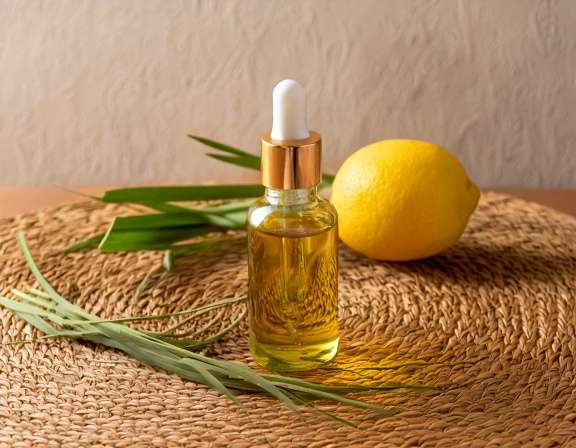 firefly generate an image of lemongrass essential oil ; aromatherapy concept, cozy home and t 303399