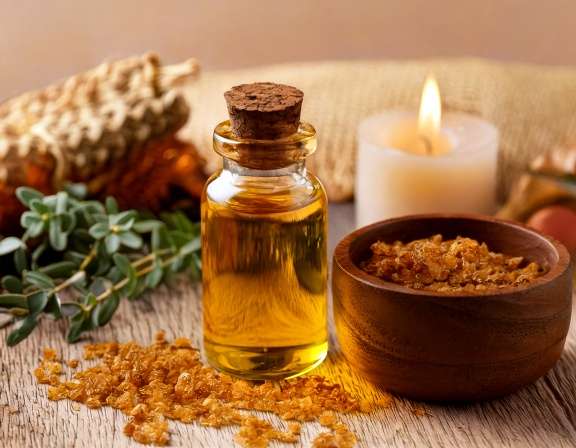 firefly generate an image of myrrh essential oil ; aromatherapy concept, cozy home and tranqu 874529